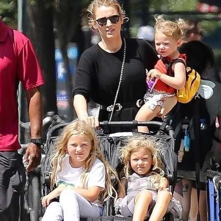 Inez Reynolds and her two sisters with their mother Blake Lively.